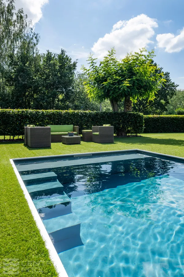 Pool set in lush garden