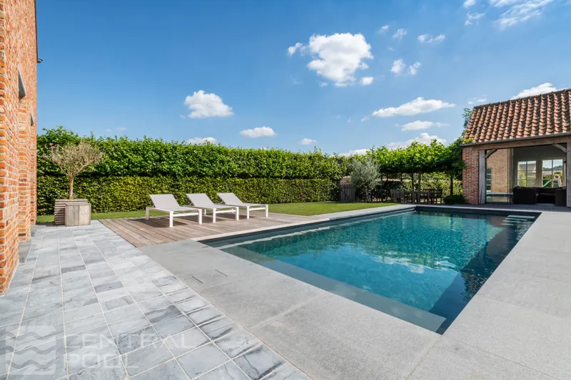 Skimmer pool with sun loungers