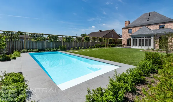 Pool in formal landscaped garden