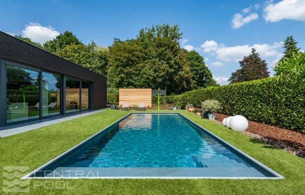 Pool alongside modern home